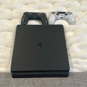 Ps4 with 2 controllers unlocked with 60+ games 1tb of storage